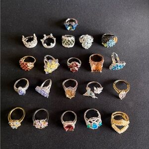 21, 925 Silver Rings with beautiful stones.